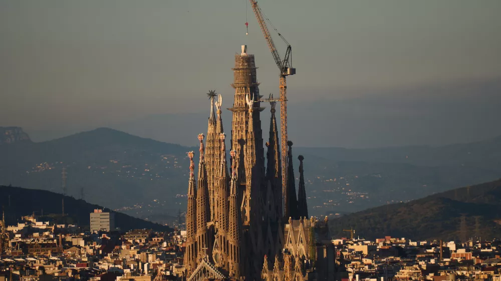View of the Sagrada Familia basilica, which became the world's tallest church on Thursday after a section of its central tower was lifted into place, in Barcelona, Spain, Oct. 30, 2025. (AP Photo/Emilio Morenatti)