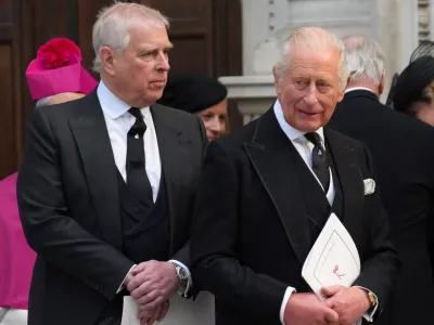 FILE - Britain's Prince Andrew, left, and Britain's King Charles III leave after the Requiem Mass service for the Duchess of Kent at Westminster Cathedral in London, Tuesday, Sept. 16, 2025. (AP Photo/Joanna Chan, File)