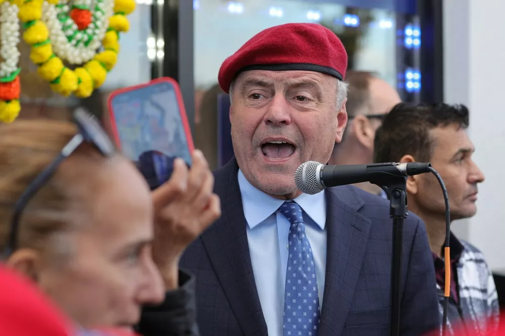 QUEENS, NEW YORK &ndash; NOVEMBER 1, 2025: Mayoral candidate and Guardian Angels founder Curtis Sliwa continued his grassroots outreach with a campaign walk along Hillside Avenue in Queens. Starting near 258th Street by the local Sliwa campaign office, he greeted residents, visited small businesses, and discussed neighborhood safety, transit, and community concerns with voters ahead of Election Day. (Photo: Luiz Rampelotto/EuropaNewswire/Sipa USA),Image: 1049779722, License: Rights-managed, Restrictions: *** World Rights *** Editorial Use Only ***, Model Release: no
