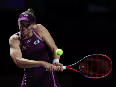 Tennis - WTA Finals - Riyadh - King Saud University Indoor Arena, Riyadh, Saudi Arabia - November 3, 2025 Kazakhstan's Elena Rybakina in action during her group stage match against Poland's Iga Swiatek REUTERS/Hamad I Mohammed
