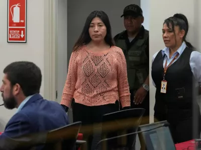 Peruvian former Prime Minister Betssy Chavez arrives for her trial on charges of rebellion and conspiracy against the state at a police base on the outskirts of Lima, Peru, Tuesday, March 18, 2025. (AP Photo/Martin Mejia)