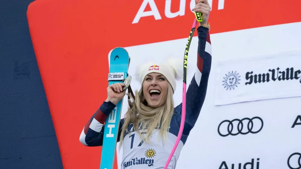 March 23, 2025, Sun Valley, Idaho, USA: US, Downhill skier LINDSEY VONN stands on the podium and celebrates as she wins a silver medal, at the women's Super-G event at the Audi FIS Ski World Cup in Sun Valley Idaho, USA, 2025.,Image: 979322112, License: Rights-managed, Restrictions:, Model Release: no