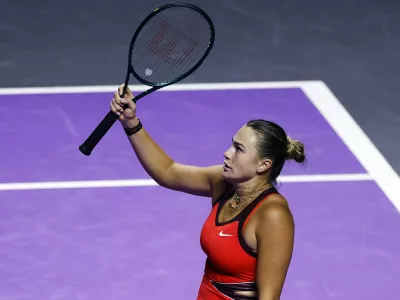 Tennis - WTA Finals - Riyadh - King Saud University Indoor Arena, Riyadh, Saudi Arabia - November 4, 2025 Belarus' Aryna Sabalenka celebrates winning her group stage match against Jessica Pegula of the U.S. REUTERS/Stephanie Lecocq