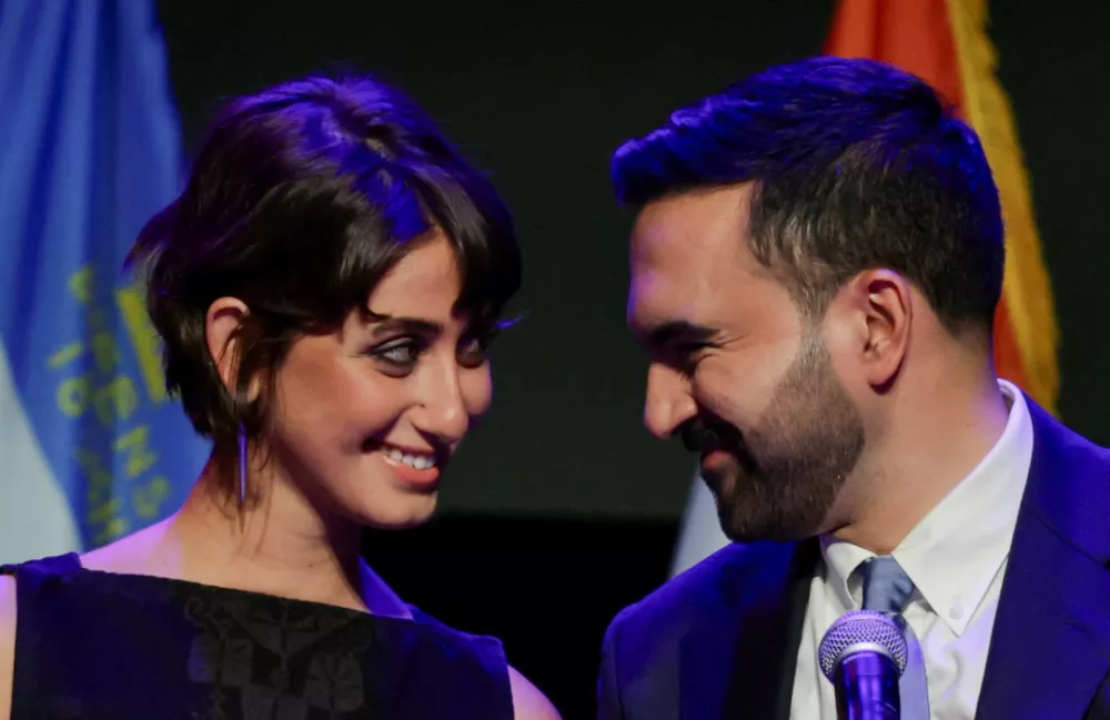 Democratic candidate for New York City mayor Zohran Mamdani looks at his wife Rama Duwaji after winning the 2025 New York City Mayoral race, at an election night rally in the Brooklyn borough of New York City, New York, U.S., November 4, 2025. REUTERS/Jeenah Moon