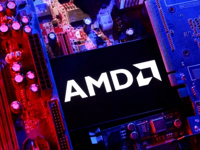 FILE PHOTO: An AMD logo and a computer motherboard appear in this illustration taken August 25, 2025. REUTERS/Dado Ruvic/Illustration/File Photo