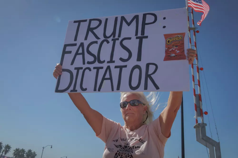Over a thousand Venice residents in Florida stood in defiance at the No Kings protest, labeled by the Trump administration as the "Antifa" or "The Hate America" rally, on October 18, 2025. The non-violent protest, also known internationally as the No Dictators or No Tyrants protest takes a stand against the authoritarian policies of Donald Trump, his administration and corruption in his administration. (Photo by Erik McGregor/Sipa USA)