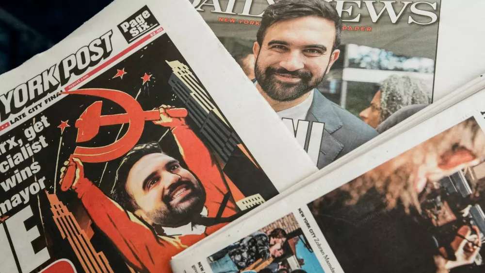 An illustration shows the Daily News and New York Post newspapers featuring Zohran Mamdani's mayoral election win stories, the morning on after Election Day in New York City, U.S., November 5, 2025. REUTERS/Eduardo Munoz/Illustratio