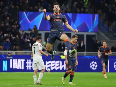 Soccer Football - UEFA Champions League - Inter Milan v Kairat - San Siro, Milan, Italy - November 5, 2025 Inter Milan's Carlos Augusto celebrates scoring their second goal REUTERS/Claudia Greco   TPX IMAGES OF THE DAY