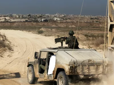 Israeli soldiers enter the Gaza Strip in a military vehicle from at the Israel-Gaza border, November 5, 2025. REUTERS/Nir Elias  EDITOR'S NOTE: REUTERS PHOTOGRAPHS WERE REVIEWED BY THE IDF AS PART OF THE CONDITIONS OF THE EMBED. SIX PHOTOS WERE REMOVED BY REUTERS UPON IDF REQUEST, CITING SECURITY CONCERNS. ALL SIX PHOTOS WERE OF AN IDF OUTPOST.
