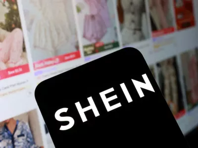 FILE PHOTO: Shein logo and their web page on smartphone in this illustration taken November 5, 2025. REUTERS/Dado Ruvic/Illustration/File Photo