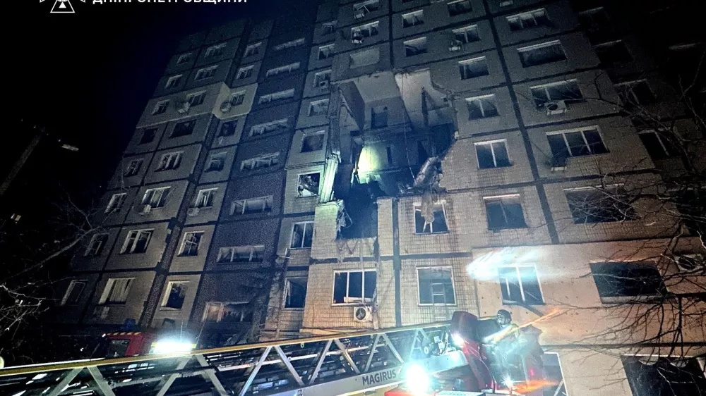 A firefighter works at the site of the apartment building hit by a Russian drone strike, amid Russia's attack on Ukraine, in Dnipropetrovsk region, Ukraine in this handout picture released November 8, 2025. Press service of the State Emergency Service of Ukraine in Dnipropetrovsk region/Handout via REUTERS ATTENTION EDITORS - THIS IMAGE HAS BEEN SUPPLIED BY A THIRD PARTY. MUST NOT OBSCURE LOGO.