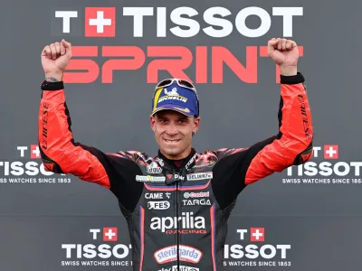 MotoGP - Indonesian Grand Prix - Mandalika International Street Circuit, Mandalika, Indonesia - October 4, 2025 Aprilia Racing's Marco Bezzecchi celebrates after winning the sprint race REUTERS/Willy Kurniawan