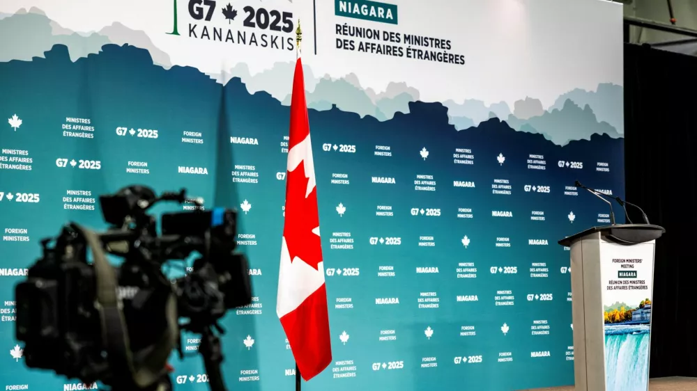 A television camera is pointed at a podium ahead of the G7 foreign ministers meeting, in Niagara-on-the-Lake, Ontario, Canada, November 11, 2025. REUTERS/Carlos Osorio