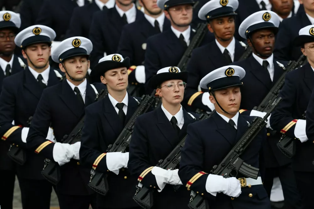Members of French Ecole des Applications Militaires de l'Energie Atomique (EAMEA) school march during the annual Bastille Day military ceremony on the Champs-Elysees avenue in Paris, France, July 14, 2025. REUTERS/Gonzalo Fuentes
