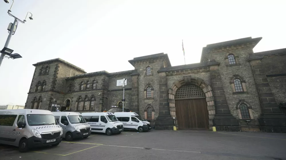 A general view of HMP Wandsworth in London where a British soldier awaiting trial on terror-related charges has escaped from a prison in southwest London Wednesday, Sept. 6, 2023 and police have launched an urgent manhunt. Counterterror police say Daniel Abed Khalife went missing from Wandsworth Prison early Wednesday. (Yui Mok/PA via AP)