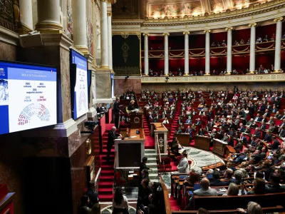 Members of the parliament vote on the Social Security Financing Bill for 2026, including the suspension of the contentious 2023 pension reform, during a session at the National Assembly in Paris, France, November 12, 2025. REUTERS/Gonzalo Fuentes