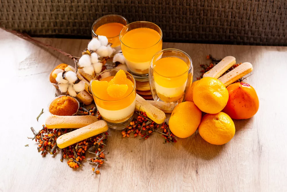 Layered dessert with tangerine and cookies / Foto: Luiza Kamenskya