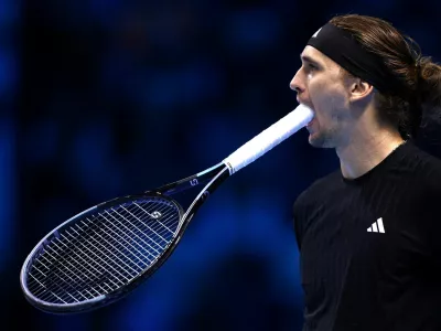 Tennis - ATP Finals - Turin - Palasport Olimpico, Turin, Italy - November 12, 2025 Germany's Alexander Zverev reacts during his group stage match against Italy's Jannik Sinner REUTERS/Guglielmo Mangiapane   TPX IMAGES OF THE DAY