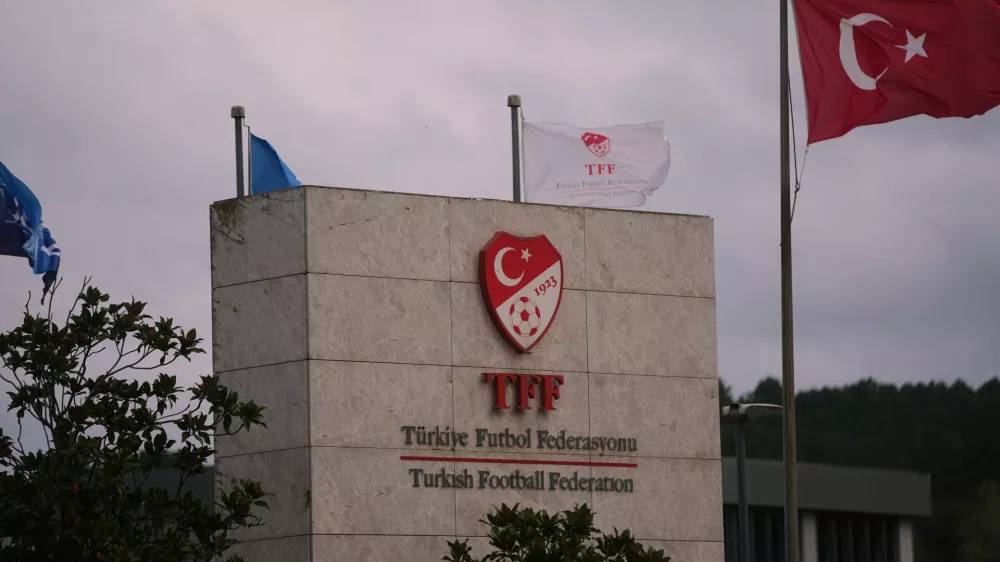 A Turkish flag waves at the Turkish Football Federation headquarters, in Istanbul, Turkey, Wednesday, Nov. 12, 2025. (AP Photo/Francisco Seco)