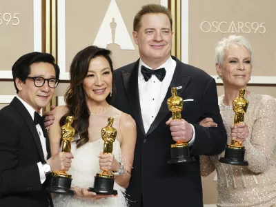 Ke Huy Quan, from left, Michelle Yeoh, Brendan Fraser and Jamie Lee Curtis pose with their awards in the press room at the Oscars on Sunday, March 12, 2023, at the Dolby Theatre in Los Angeles. Brendan Fraser, third from left, won best performance by an actor in a leading role for "The Whale." Ke Huy Quan, from left, Michelle Yeoh and Jamie Lee Curtis all won for their leading and supporting roles in "Everything Everywhere All at Once." (Photo by Jordan Strauss/Invision/AP)