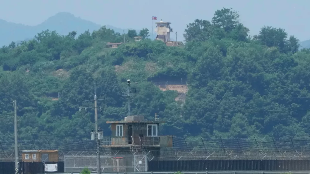 FILE - A North Korean military guard post, top, and a South Korean post, bottom, are seen from Paju, South Korea, near the border with North Korea, on June 18, 2024. (AP Photo/Ahn Young-joon, File)