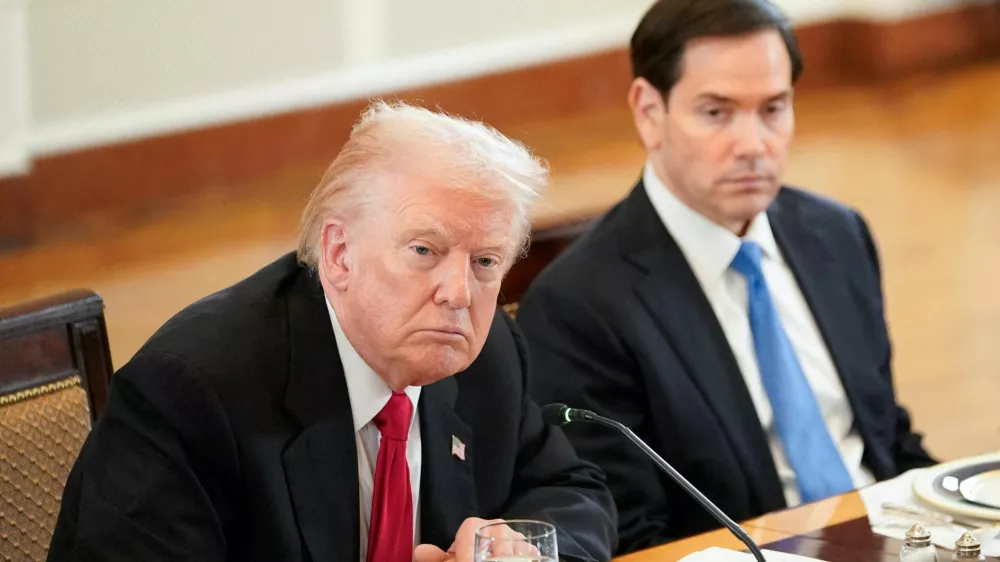 FILE PHOTO: U.S. President Donald Trump and Secretary of State Marco Rubio attend a dinner with the leaders of the C5+1Central Asian countries of Kazakhstan, Kyrgyzstan, Tajikistan, Turkmenistan, and Uzbekistan, in the East Room of the White House in Washington, D.C., U.S., November 6, 2025. REUTERS/Nathan Howard/File Photo