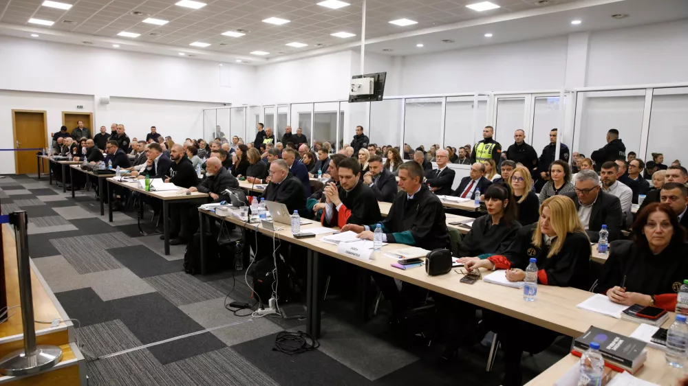 Prosecutors, defendants and lawyers background are seen inside a courtroom near Skopje, North Macedonia, on Wednesday, Nov. 19, 2025, ahead the start of the trial over the Kocani nightclub fire, eight months after the country's deadliest blaze killed 63 people and injured more than 200. (AP Photo/Boris Grdanoski)