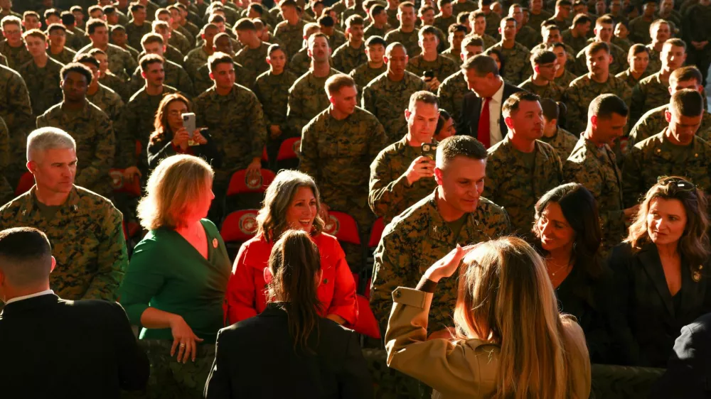 U.S. first lady Melania Trump meets with military service members and their families at Marine Corps Air Station New River in Jacksonville, North Carolina, U.S., November 19, 2025. REUTERS/Kevin Lamarque