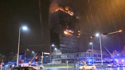 Firefighters work to extinguish the fire that caught 'Vjesnik' skyscraper, which used to accommodate most of Croatian media companies, in Zagreb, Croatia, early Tuesday, Nov. 18, 2025. (AP Photo/Damir Krajac)