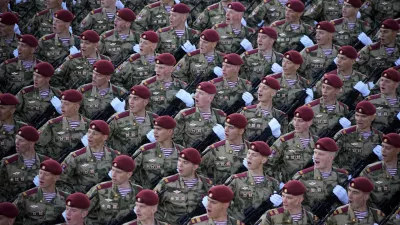 Russian soldiers march toward Red Square to attend a Victory Day military parade in Moscow, Russia, Tuesday, May 9, 2023, marking the 78th anniversary of the end of World War II. (AP Photo/Alexander Zemlianichenko)