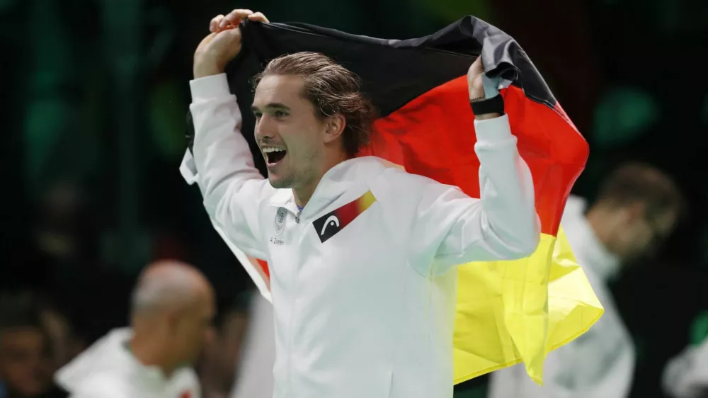 Tennis - Davis Cup - Final 8 - Argentina v Germany - SuperTennis Arena, Bologna, Italy - November 21, 2025  Germany's Alexander Zverev celebrates winning the quarter final against Argentina REUTERS/Alessandro Garofalo