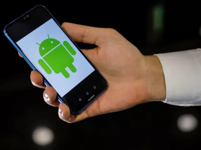 An Android logo is displayed on a Huawei smartphone in this illustration picture May 20, 2019. REUTERS/Marko Djurica/Illustration