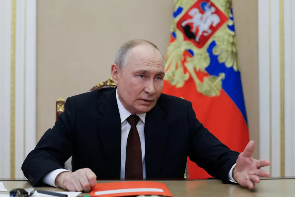 Russian President Vladimir Putin chairs a meeting with members of the Security Council via video link at the Kremlin in Moscow, Russia November 21, 2025. Sputnik/Gavriil Grigorov/Pool via REUTERS ATTENTION EDITORS - THIS IMAGE WAS PROVIDED BY A THIRD PARTY.