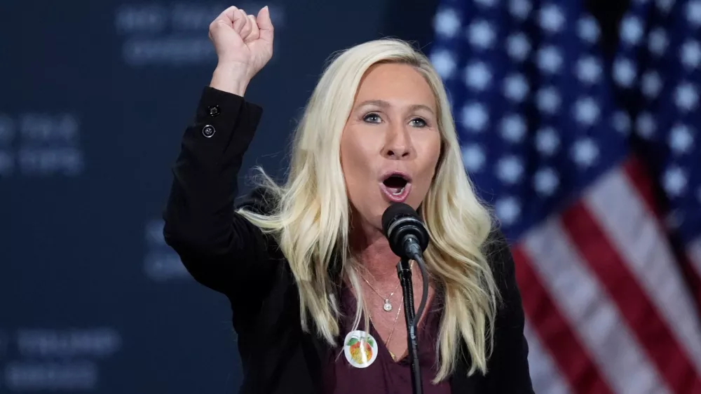 FILE - Rep. Marjorie Taylor Greene, R-Ga., speaks before Republican presidential nominee former President Donald Trump at a campaign event at the Cobb Energy Performing Arts Centre, Oct. 15, 2024, in Atlanta. (AP Photo/John Bazemore, File)