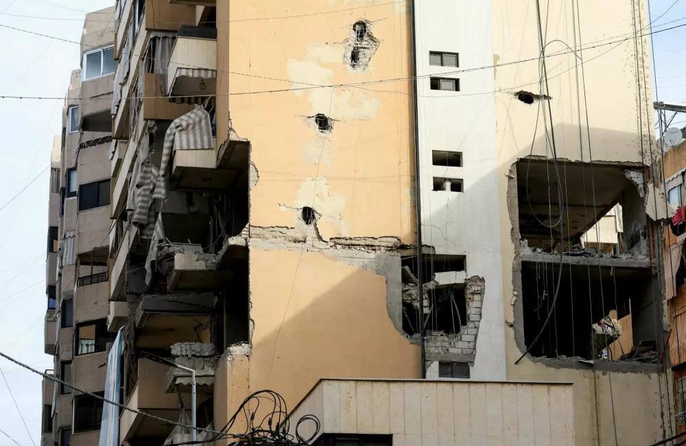 Damaged building from Sunday's Israeli strike, after what the Israeli military said was an airstrike that killed Hezbollah's top military official, following a U.S.-brokered truce a year ago, in Beirut's southern suburbs, Lebanon November 24, 2025. REUTERS/Mohamed Azakir