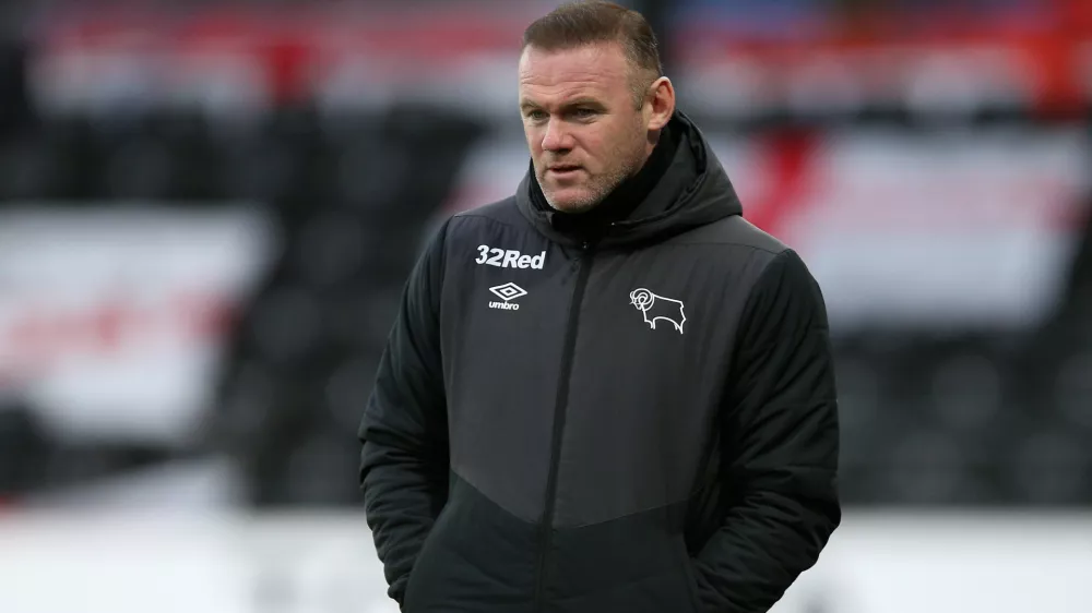 16 January 2021, United Kingdom, Derby: Derby County's manager Wayne Rooney reacts on the touchline during the English EFL Championship soccer match between Derby County and Rotherham United at Pride Park. Photo: Nigel French/PA Wire/dpa