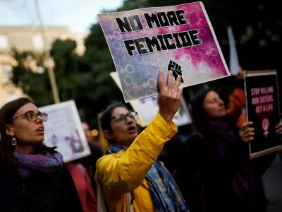 People attend a demonstration to protest against femicide, sexual violence and all gender-based violence ahead of the International Day for Elimination of Violence Against Women, in Valletta, Malta November 23, 2025. REUTERS/Darrin Zammit Lupi