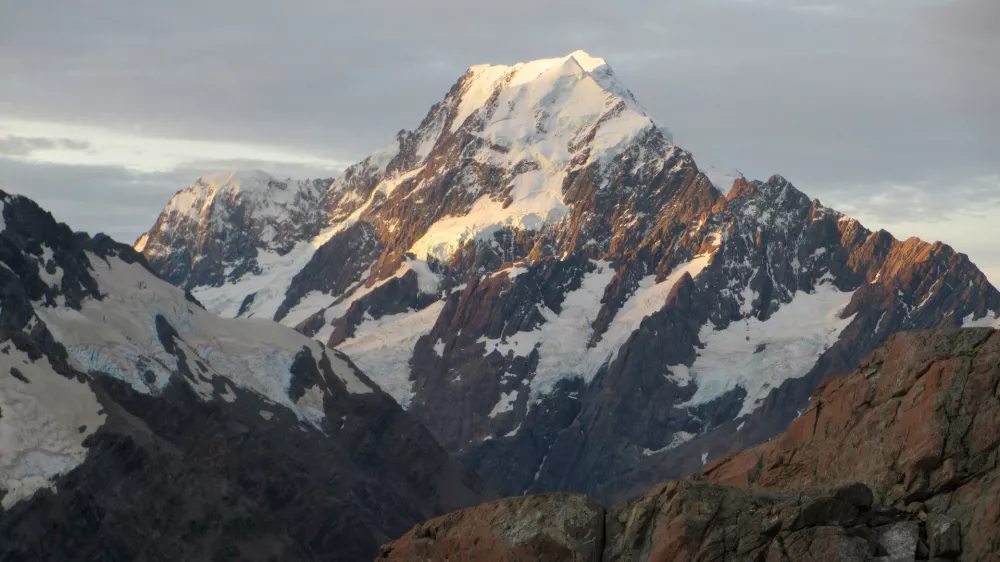 FILE - Aoraki, also known as Mount Cook, New Zealand's highest mountain, is shown at sunset, March 30, 2014, in Twizel, New Zealand. (AP Photo/Carey J. Williams, File)