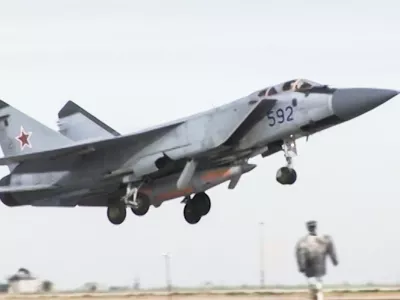 In this video grab provided by RU-RTR Russian television via AP television on Thursday, March 1, 2018, a Russian MiG-31 fighter jet carrying the new Kinzhal hypersonic missile flies at an undisclosed location in Russia. President Vladimir Putin declared Thursday that Russia has developed a range of new nuclear weapons, claiming they can't be intercepted by enemy. (RU-RTR Russian Television via AP)