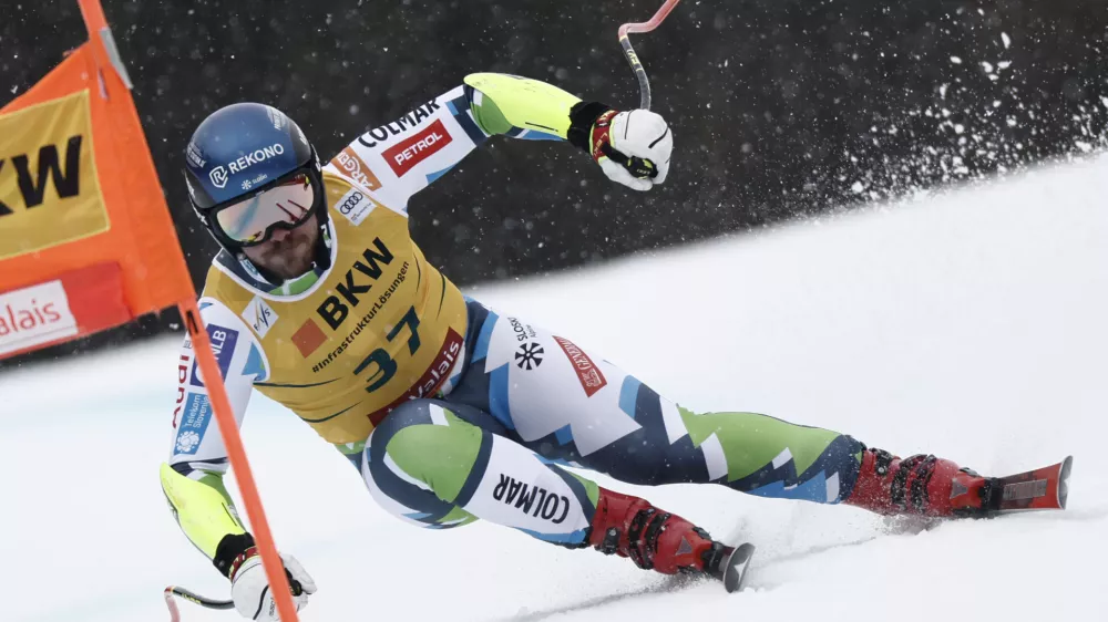 Slovenia's Miha Hrobat speeds down the course during an alpine ski, men's World Cup super G, in Crans Montana, Switzerland, Sunday, Feb. 23 2025. (AP Photo/Gabriele Facciotti)