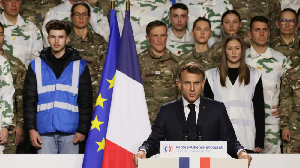 France's President Emmanuel Macron, unveils a new national military service as he speaks to the army at the military base in Varces, French Alps, Thursday, Nov. 27, 2025.(AP Photo/Thomas Padilla, Pool)