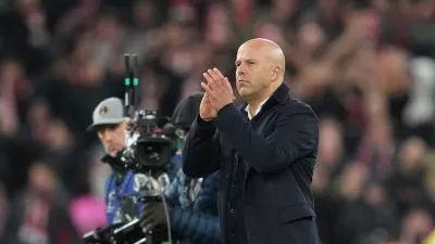 Liverpool's manager Arne Slot applauds after the Champions League opening phase soccer match between Liverpool and PSV in Liverpool, England, Wednesday, Nov. 26, 2025. (AP Photo/Jon Super)