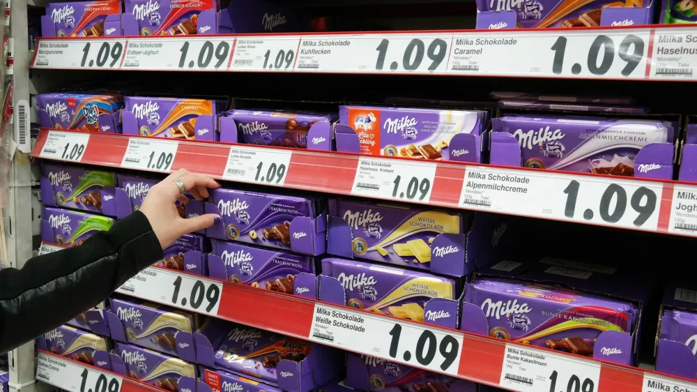 GERMANY - FEBRUARY 2015: Shelves with a variety of Milka chocolate bars in a Kaufland supermarket. Milka is a traditional Swiss brand of chocolate confection, since 1990 manufactured by US-american Mondelēz International,Image: 228895946, License: Rights-managed, Restrictions: Usage restrictions: Advertising and promotion,Commercial electronic,Consumer goods,Direct mail and brochures,Indoor display,Internal business usage,Personal use, Model Release: no