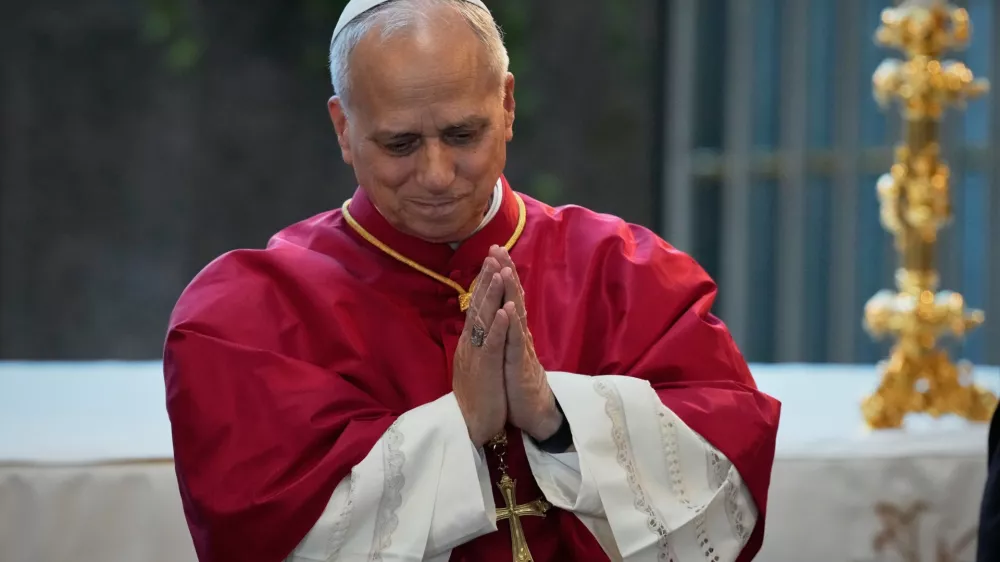 Pope Leo XIV acknowledges the crowd during a gathering with bishops, priests, consecrated persons, and pastoral workers at the Our Lady of Lebanon basilica in Harissa, Lebanon, Monday, Dec. 1, 2025. (AP Photo/Hussein Malla)