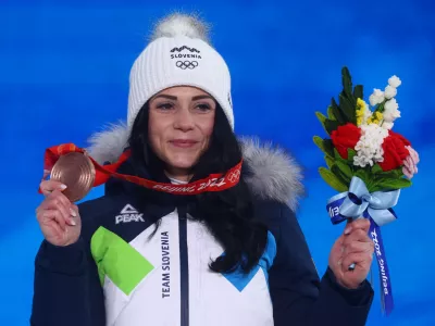 2022 Beijing Olympics - Victory Ceremony - Snowboard - Women's Parallel Giant Slalom - Zhangjiakou Medals Plaza, Zhangjiakou, China - February 8, 2022. Bronze medallist Gloria Kotnik of Slovenia poses with her medal during the victory ceremony. REUTERS/Kai Pfaffenbach