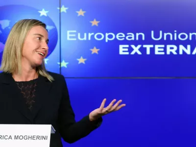 European Union foreign policy chief Federica Mogherini addresses a news conference after meeting NATO Secretary General Jens Stoltenberg (unseen) at the European External Action Service (EEAS) building in Brussels November 4, 2014.  REUTERS/Francois Lenoir (BELGIUM - Tags: POLITICS)