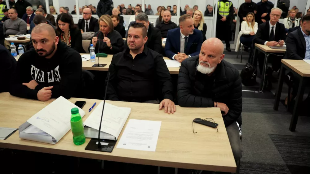 Suspects of the Pulse nightclub fire in Kocani attend a trial at the courthouse in Idrizovo, North Macedonia, November 19, 2025. Thirty seven people have been charged in connection with the fatal disco fire in Kocani in March, which killed 63 people. REUTERS/Valdrin Xhemaj