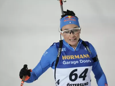 Dorothea Wierer, Italy, crosses the finish line of the Biathlon women's World Cup 15 km event, in &Ouml;stersund, Sweden, Tuesday, Dec. 2, 2025. (Bj&ouml;rn Larsson Rosvall/TT News Agency via AP)