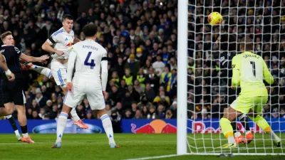 Leeds United's Jaka Bijol, third right, scores his sides first goal of the game during the English Premier League soccer match between Leeds United and Chelsea in Leeds, England, Wednesday Dec. 3, 2025. (Mike Egerton/PA via AP)