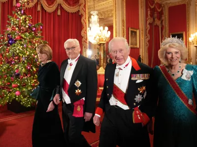 03 December 2025, United Kingdom, Windsor: UK King Charles III and Queen Camilla (R) arrive with German President Frank-Walter Steinmeier and his wife Elke Buedenbender ahead of the state banquet for the German President and his wife, at Windsor Castle, on day one of their state visit to the UK. Photo: Carlos Jasso/PA Wire/dpa